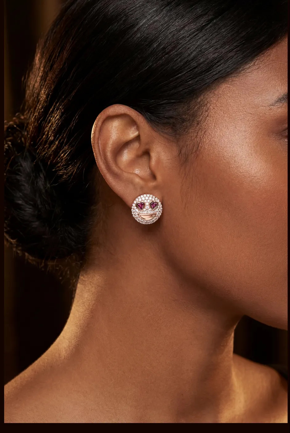 Heart eyes stud earring worn