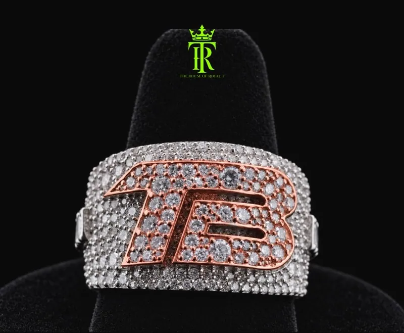 Custom ring with raised TB initials in contrasting metal